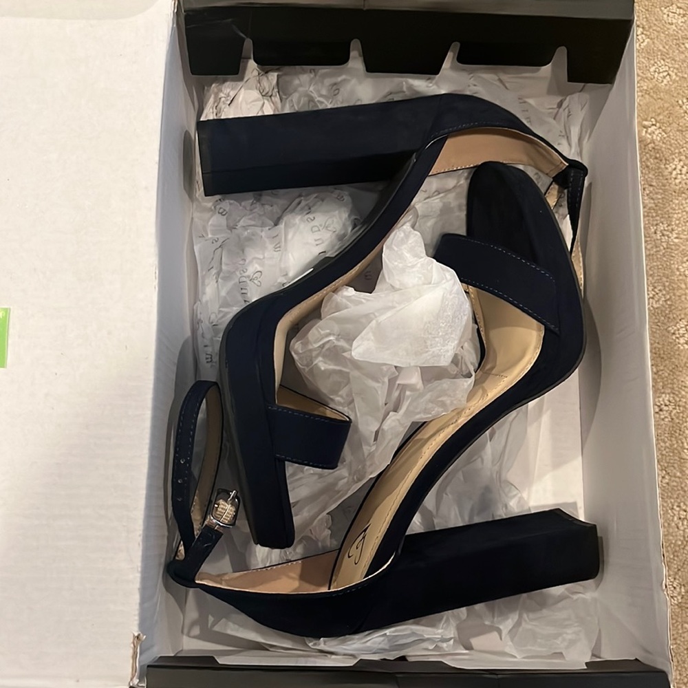Windsor navy blue high heels with strap. Size 7. Never worn and still in box.